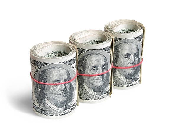 istock rolls of dollars 163257840