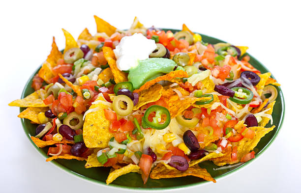 Nachos Nachos on the plate nacho chip stock pictures, royalty-free photos & images