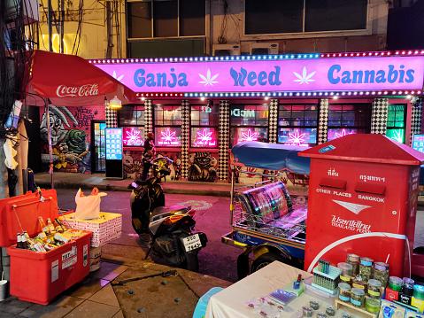 One of the many cannabis shops who have sprung up around Bangkok, along Sukhumvit road by night.