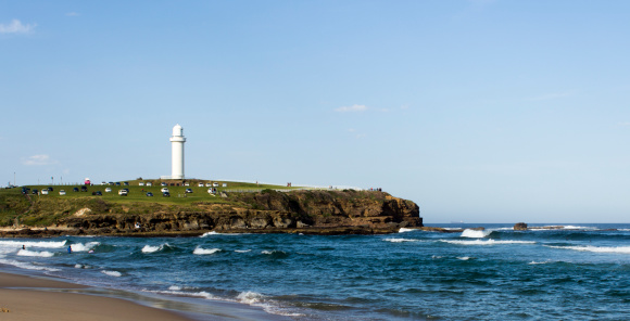 Landscape photo of headlands and lighthouse in Wollongong NSW.
