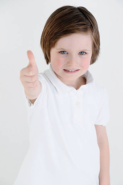 istock Little boy thumbs up 163263912