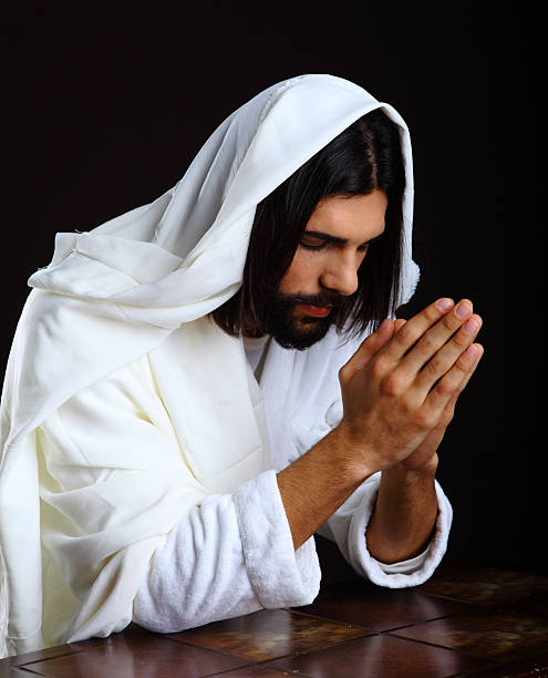 istock Praying Jesus Christ of Nazareth 163265522