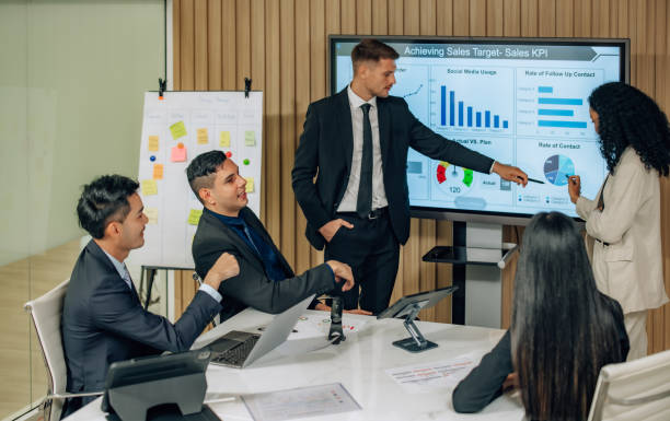 istock Diverse team innovates for sales KPIs via collaborative brainstorming to develop business models. 1632686772