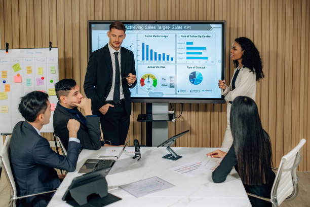 istock Diverse team innovates for sales KPIs via collaborative brainstorming to develop business models. 1632686774