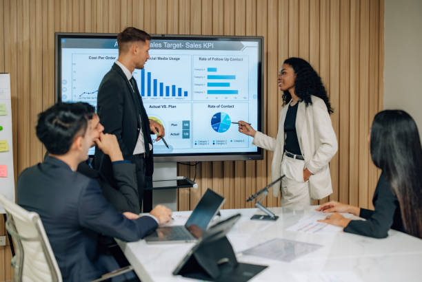 istock Diverse team innovates for sales KPIs via collaborative brainstorming to develop business models. 1632687812