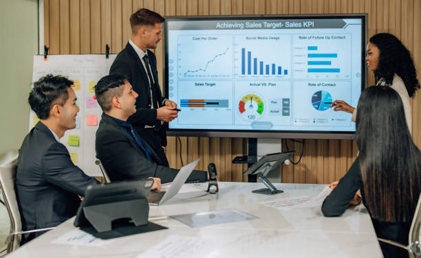 istock Diverse team innovates for sales KPIs via collaborative brainstorming to develop business models. 1632687813