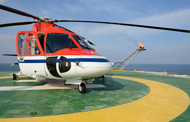 istock Helicopter park on oil rig 163269971