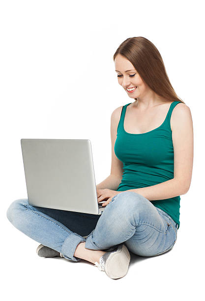 istock Young woman sitting with laptop 163269977