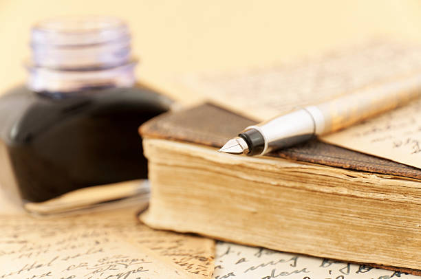 istock Vintage book and fountain pen 163270085