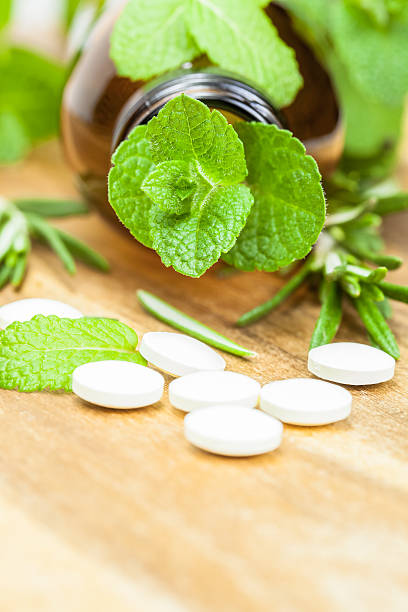 istock Alternative medicine with herbal and homeopathic pills 163270094