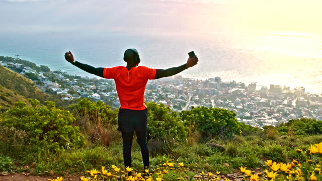 Nature view, black man and running celebrate in exercise achievement, outdoor freedom or fitness goals success. City person, cheers or African runner excited for winner, victory or sports challenge