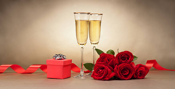 istock Champagne glasses, present and roses 163272129