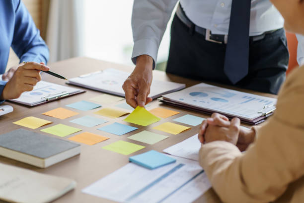 istock Business People brainstorming Meeting Design Ideas use post it notes to share idea professional investor start up project business brainstorming planning in office 1632749431