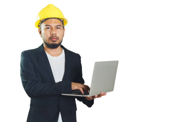 istock Asian engineering man wears hardhat holding working with laptop isolated on white background. foreman control construction. clipping path. 1632758741