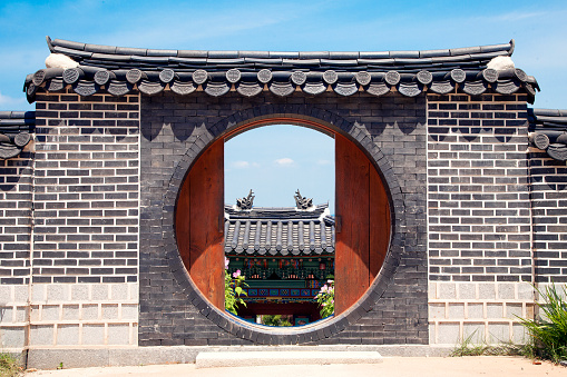 Garden entrance arch It is an ancient Korean architecture and blue sky. At Suncheon Bay National Garden, Korea