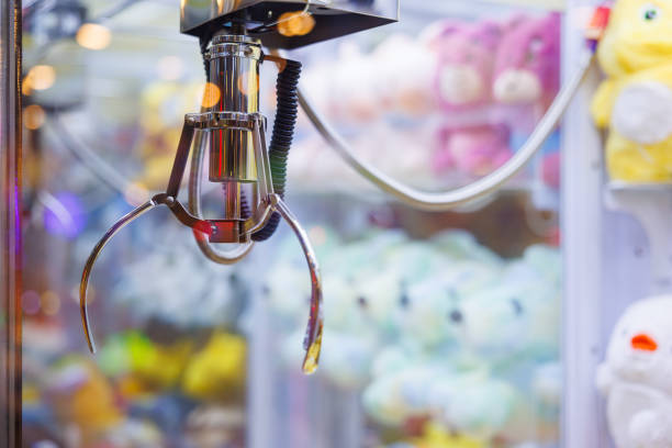istock Claw Machines Toy Arcade game. doll picker. 1632798320