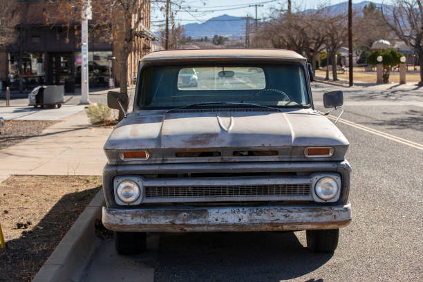 Clarkdale, Arizona, USA - January 3, 2022: Morning light shines on a vintage truck parked in historic downtown Clarkdale.