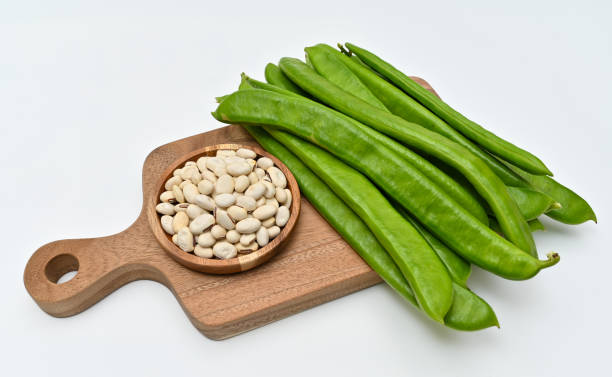 Sword beans with fresh vegetables on white background stock photo