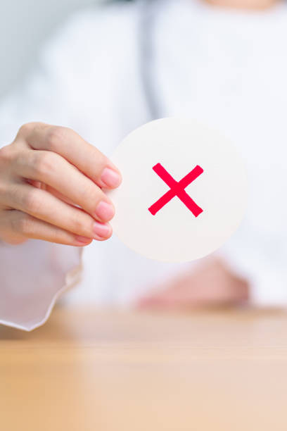 istock Doctor show Wrong symbol paper. True and false, accept and rejected, evaluation, Diagnosis, Vote, Poll, Yes or No, Health, Medical and Survey concepts 1632852112