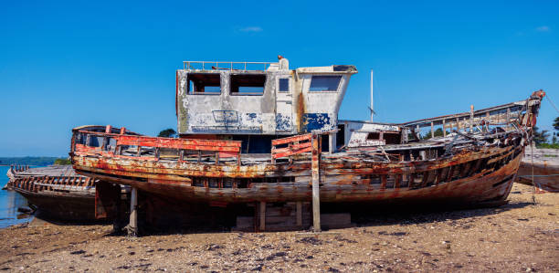 istock old boat,  abandoned shipwreck in the bay 1632891908