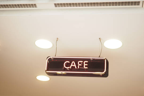 istock Glowing neon sign with words cafe . 1632948286