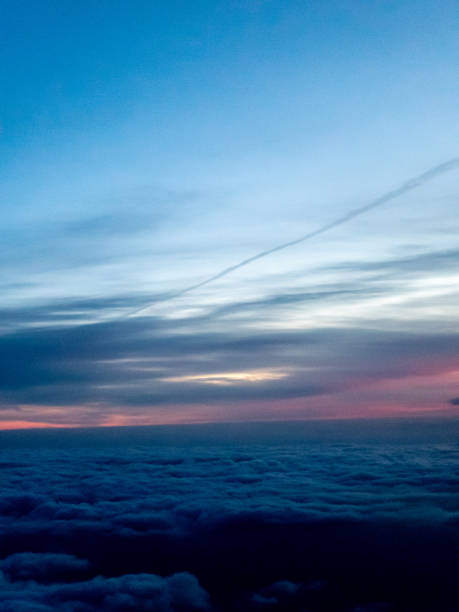 istock Sky and clouds on sunrise from airplane 1632984044