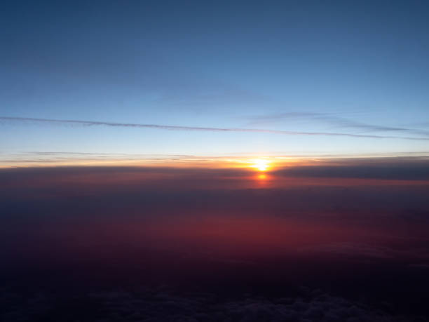 istock Sky and clouds on sunrise from airplane 1632986190