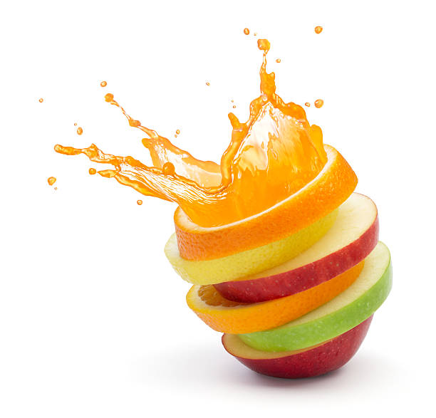 fruit punch various type of fruit slices stacked with splash, fruit punch concept green apple slice stock pictures, royalty-free photos & images