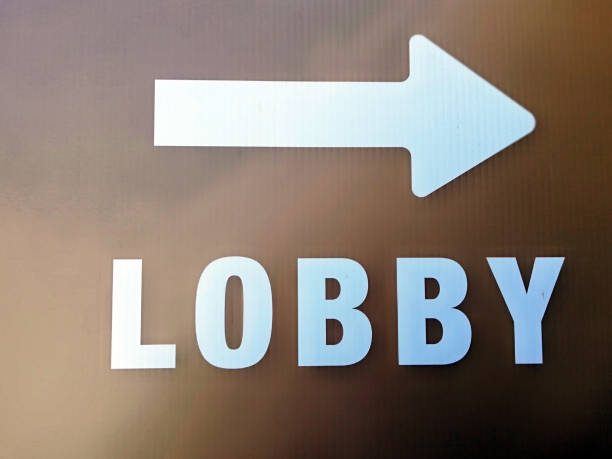 istock Lobby sign with white color on brown background 1633000503