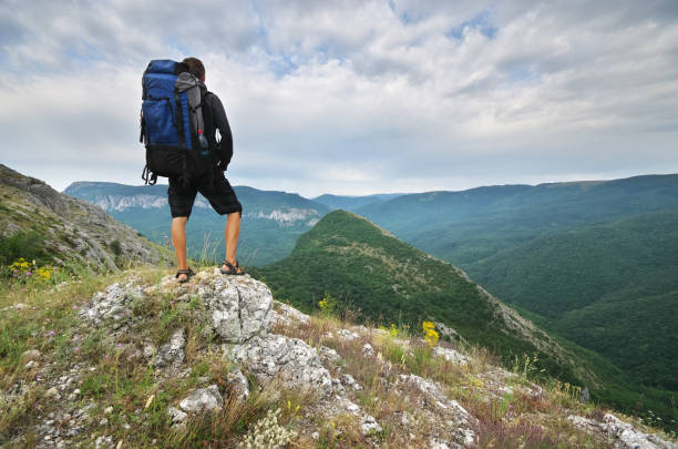istock Traveler tourist in mountain. 1633001177