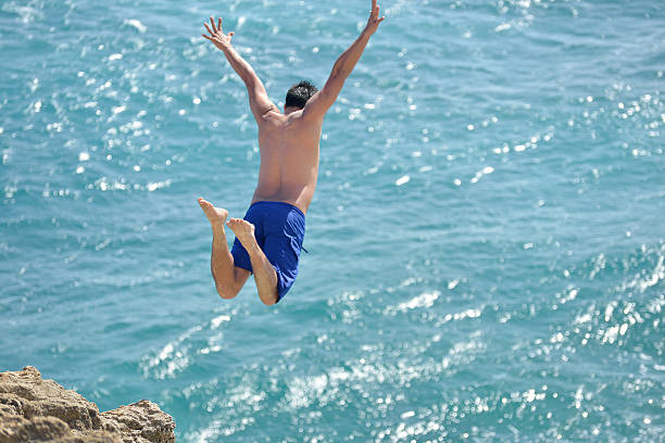 istock Cliff Diving in Kauai, Hawaii USA 163300142