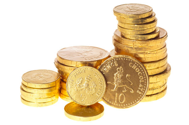 istock Chocolate money coins stacked on white 163301613