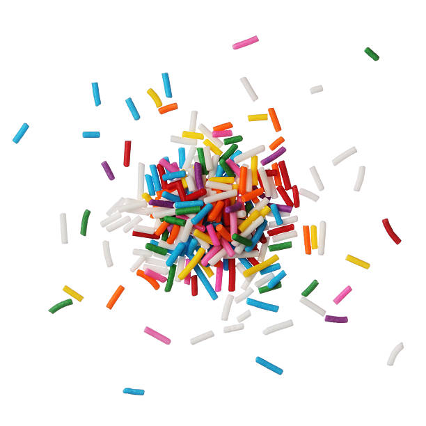 Colorful candy sprinkles isolated on white background Colorful candy sprinkles isolated on white background sugar sprinkles stock pictures, royalty-free photos & images