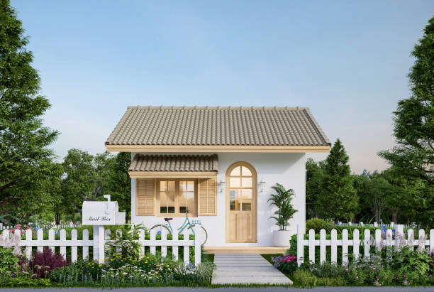 Modern contemporary cute tiny house exterior surrounded by nature 3d render Modern contemporary cute tiny house exterior surrounded by nature 3d render There are white fence with flower bush, white wall, brown roof and wooden arch window. tiny house stock pictures, royalty-free photos & images