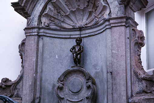 Iconic Brussels Charm: Gaze upon the beloved Manneken Pis statue, a symbol of Brussels' whimsy and charm. This pint-sized bronze figure captures the city's playful spirit, inviting smiles and snapshots from visitors around the world.
