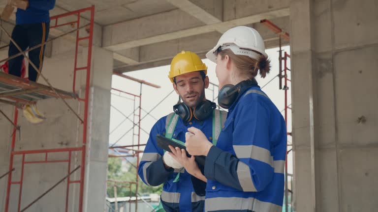 Engineer team reviewed the inspection at the house construction site.