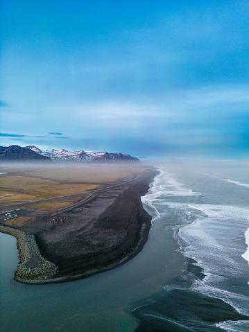 Fantastic northern scene with oceanfront in iceland, drone shot of Atlantic coastline and black sand beach. Nordic country with stunning natural views and picturesque setting.