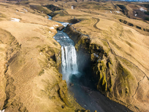 istock Drone shot of skgafoss cascade falling 1633071407