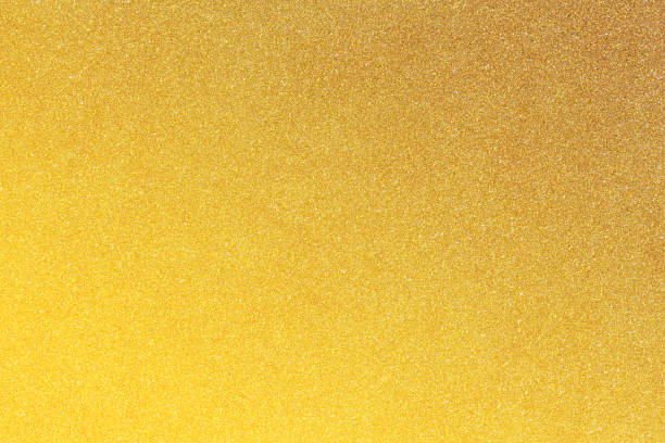 istock gold glitter paper abstract, natural grunge texture background 1633071962