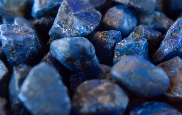 istock Lapis Is a beautiful natural gemstone on a wooden floor 1633072958