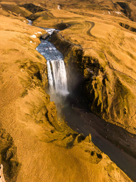 istock Drone shot of major waterfall in Iceland 1633074094