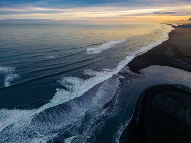 istock Drone shot of arctic black sand beach 1633076179