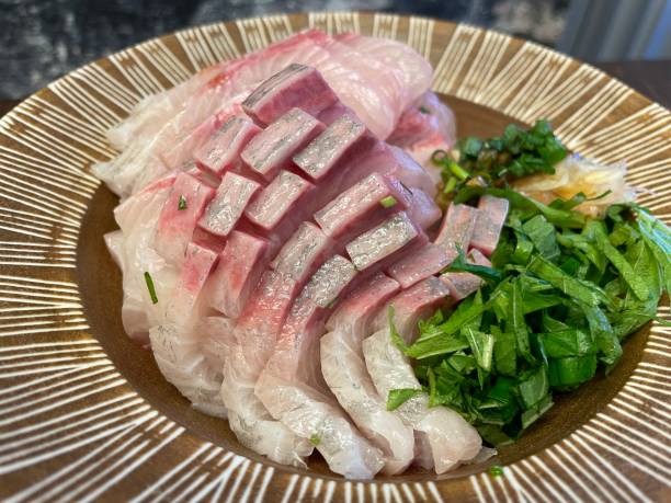 istock Sashimi of fatty kanpachi (greater amberjack) 1633087408
