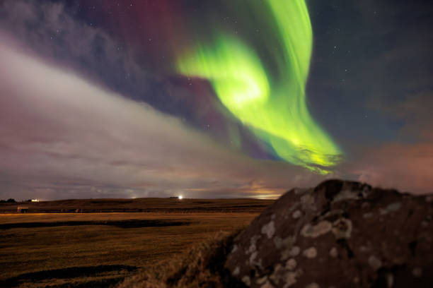 istock Aurora borealis above snowy mountain 1633091602
