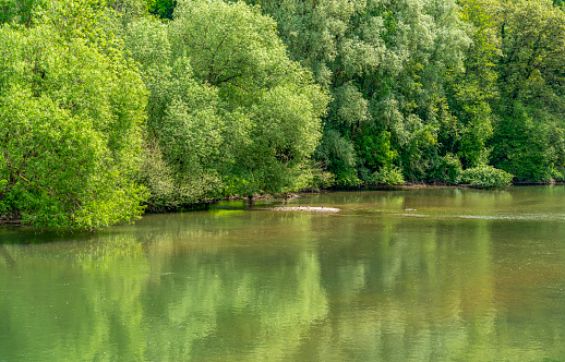Sunny scenery around the Jagst river in Southern Germany at early summer time