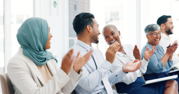 istock Diversity, business people and applause presentation, employee support and happiness in office. Interracial teamwork, clapping hands and audience smile for workshop achievement or goals celebration 1633189087