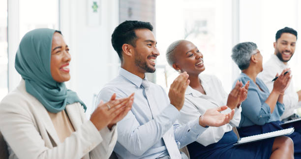 istock Diversity, business people and applause presentation, employee support and happiness in office. Interracial teamwork, clapping hands and audience smile for workshop achievement or goals celebration 1633189111