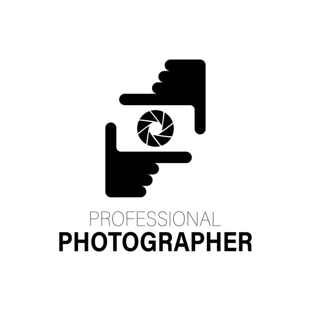 aparat z logo w rękach fotografa - photography lens aperture sharp stock illustrations