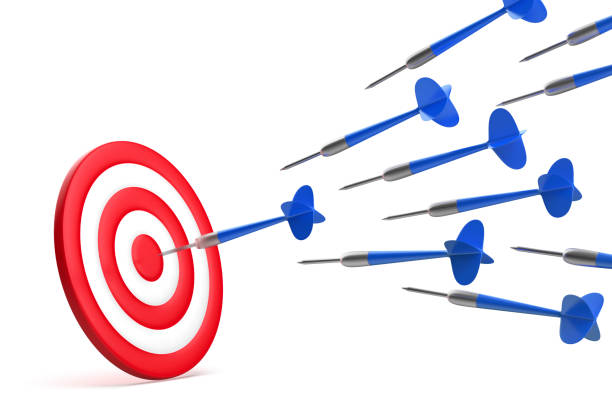 Picture of a three red darts with a dartboard in the background