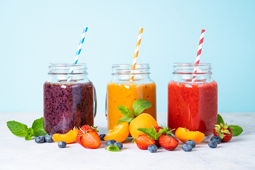 Smoothie with fresh fruits and berries. Smoothie set in jars.